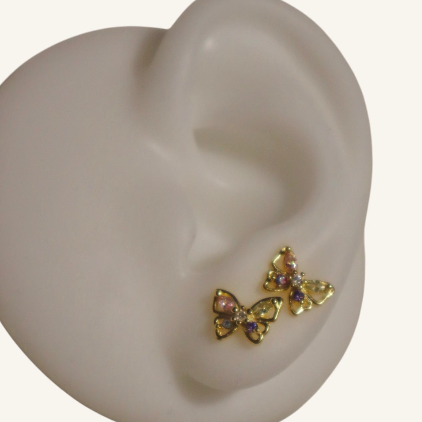 Piercing mariposa colores